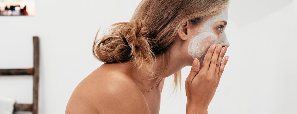 Woman choosing products from drugstore